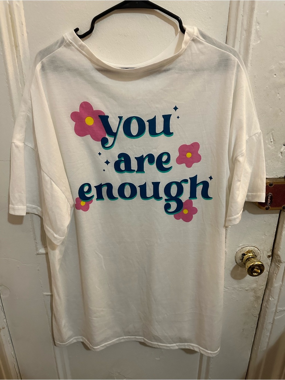 SHEIN White Graphic Tee with Teal Text & Pink Flower Accents